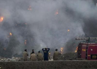 آتش سوزی مهیب در محل دفن زباله در دهلی نو